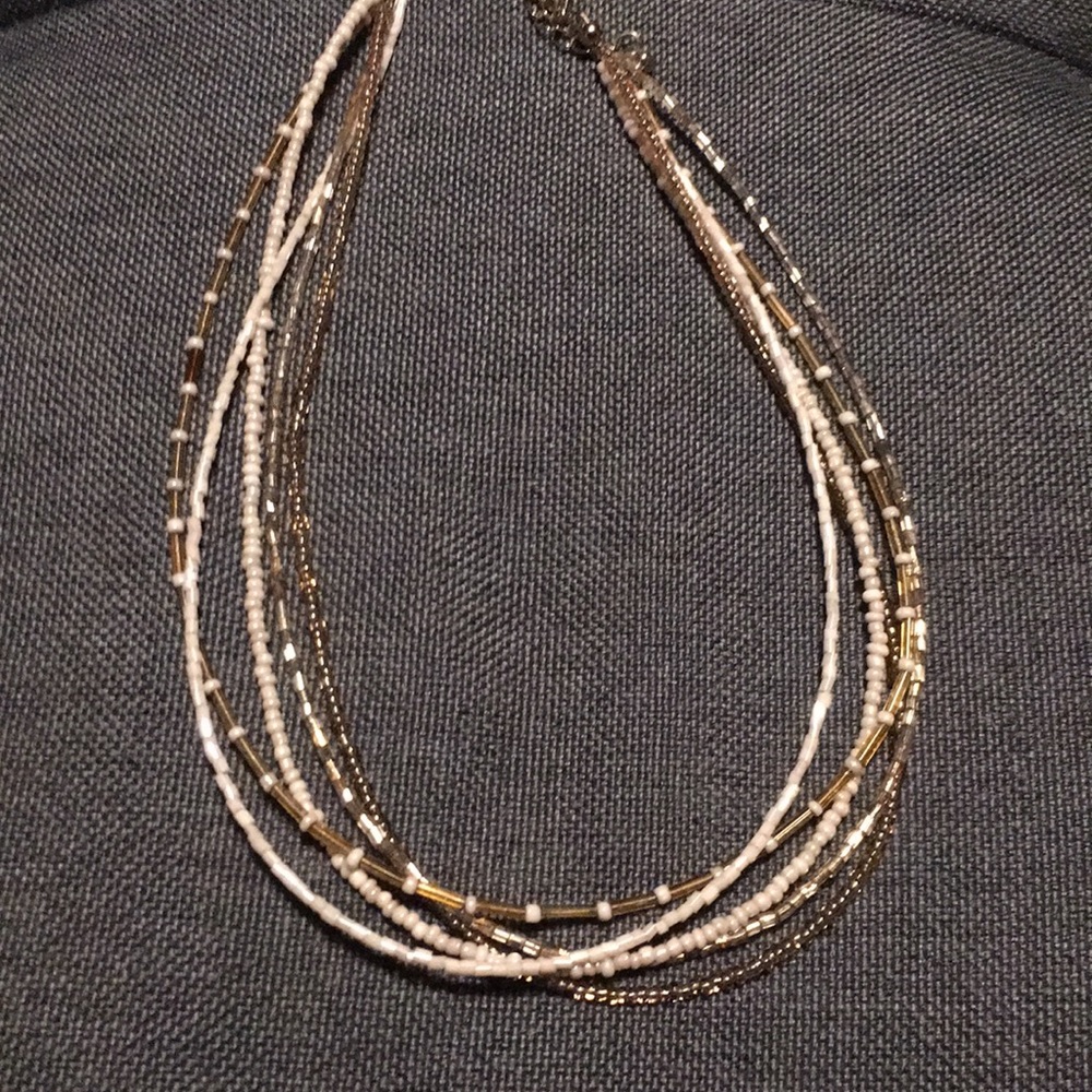 Super cute neutral beaded necklace.
